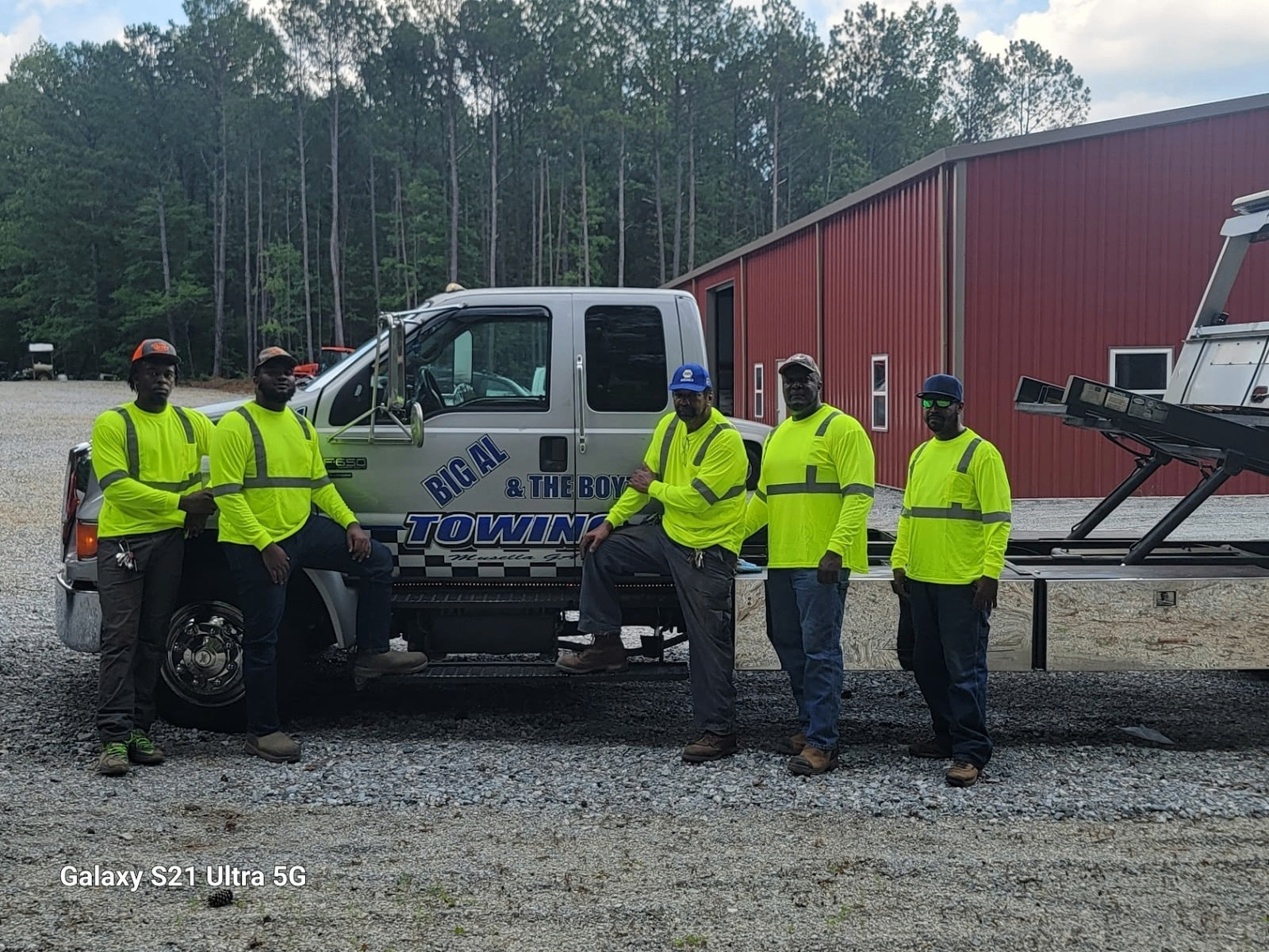 Big Al & The Boyz team with tow truck